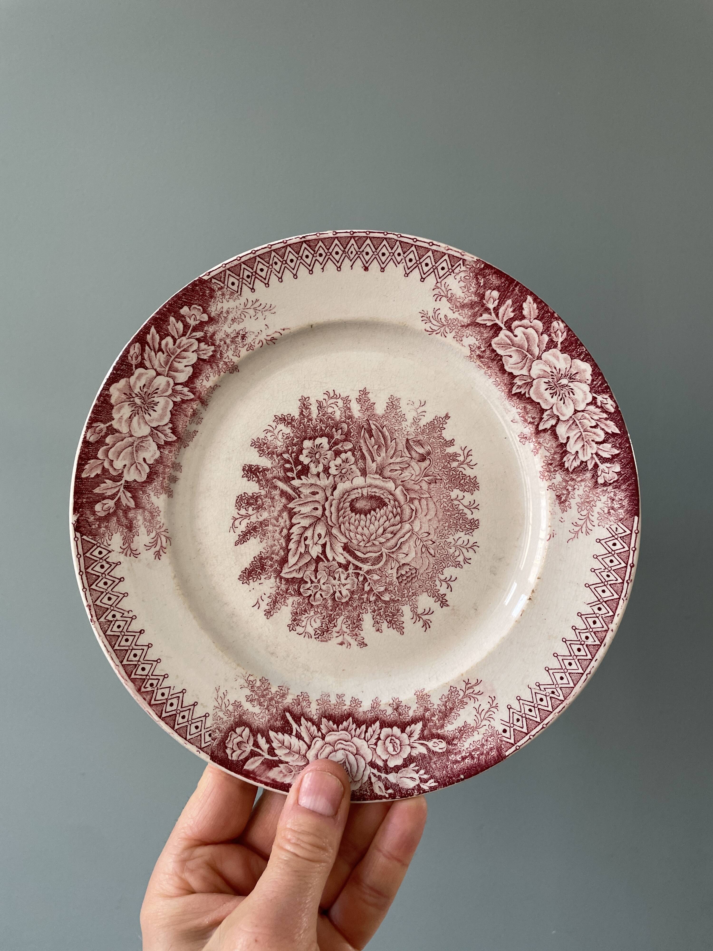 Series of 12 mismatched Terre de Fer dessert plates