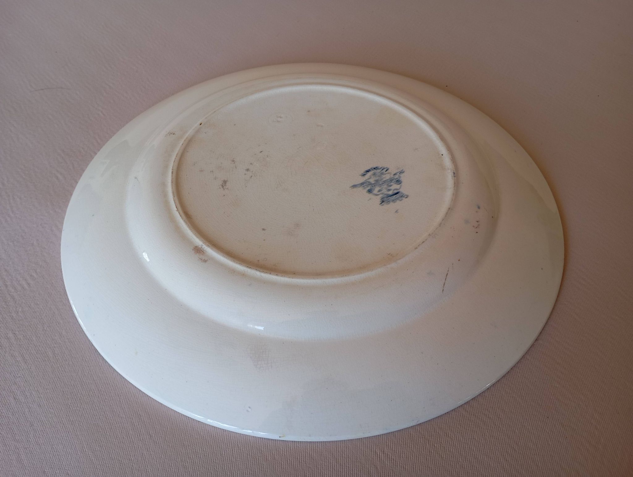 Plat à gâteau en terre de fer Longwy "Marguerites"