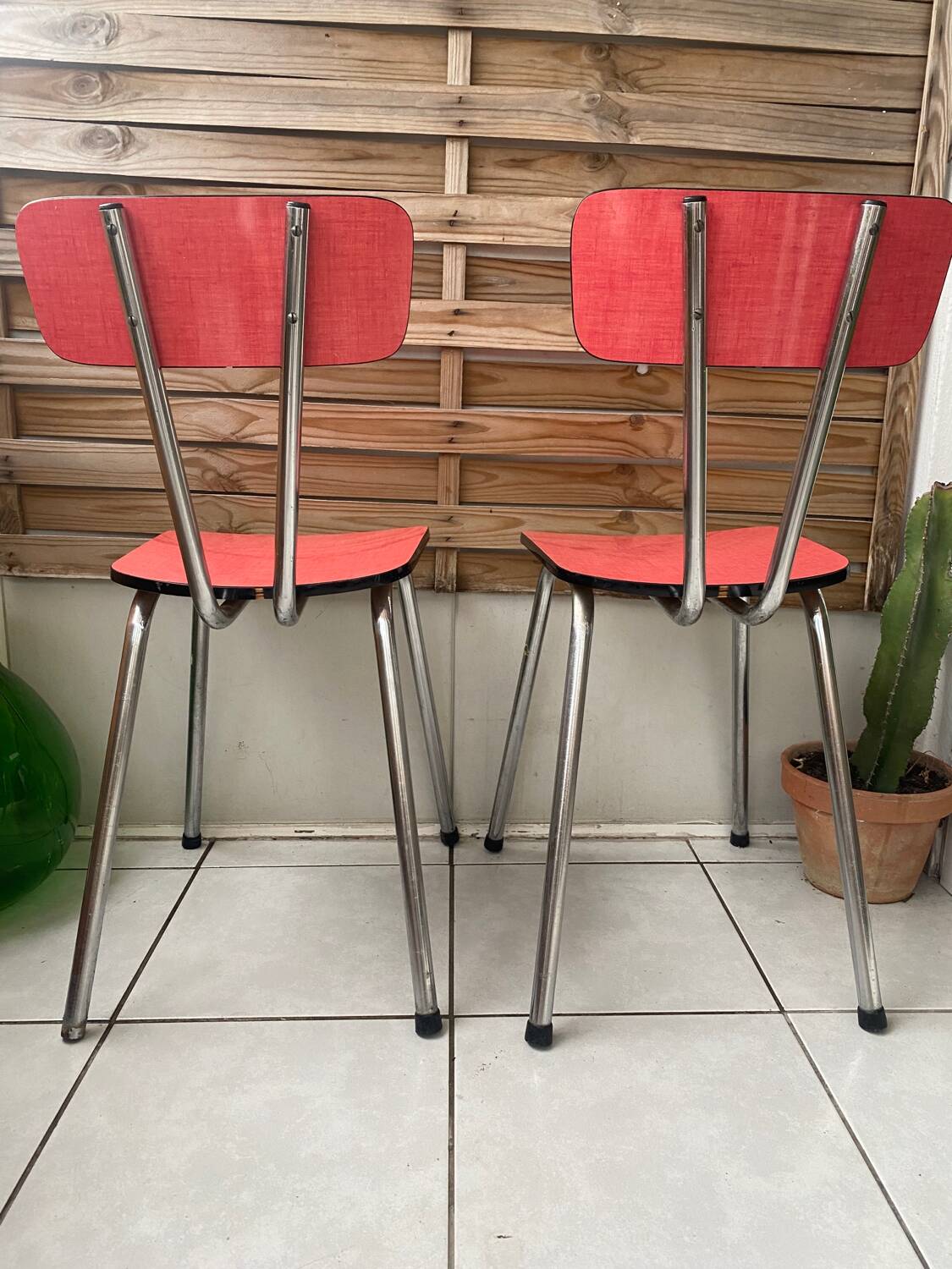 Pair of raspberry formica chairs