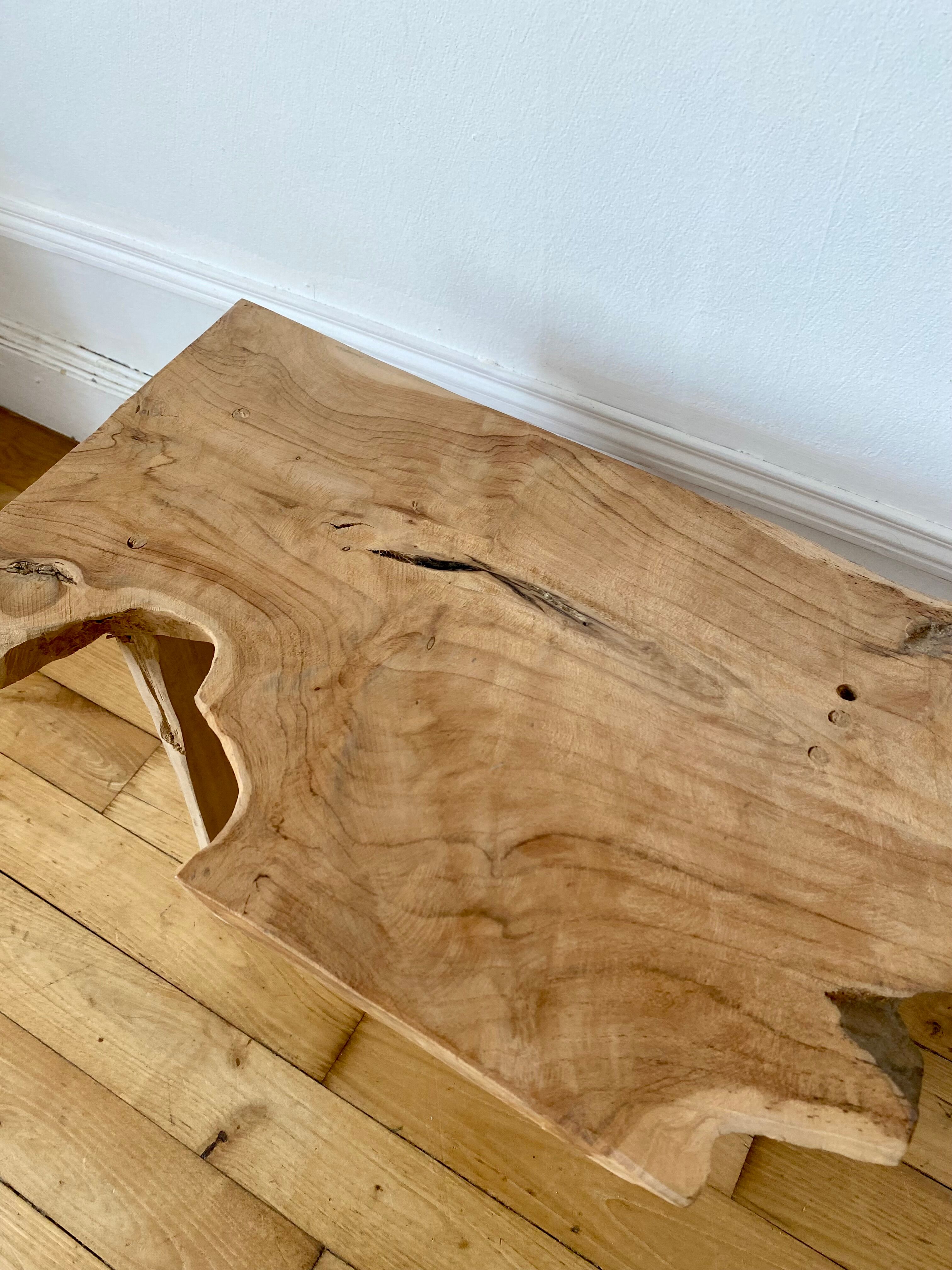 Low stool in raw wood