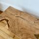 Tabouret bas en bois brut