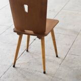 Series of four vintage brutalist wooden chairs 1960