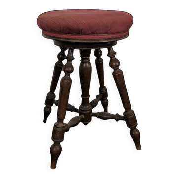 Tabouret de piano à quatre pieds tournés en tissu rose