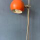 Mid-Century orange floor lamp with "eyeball" shade