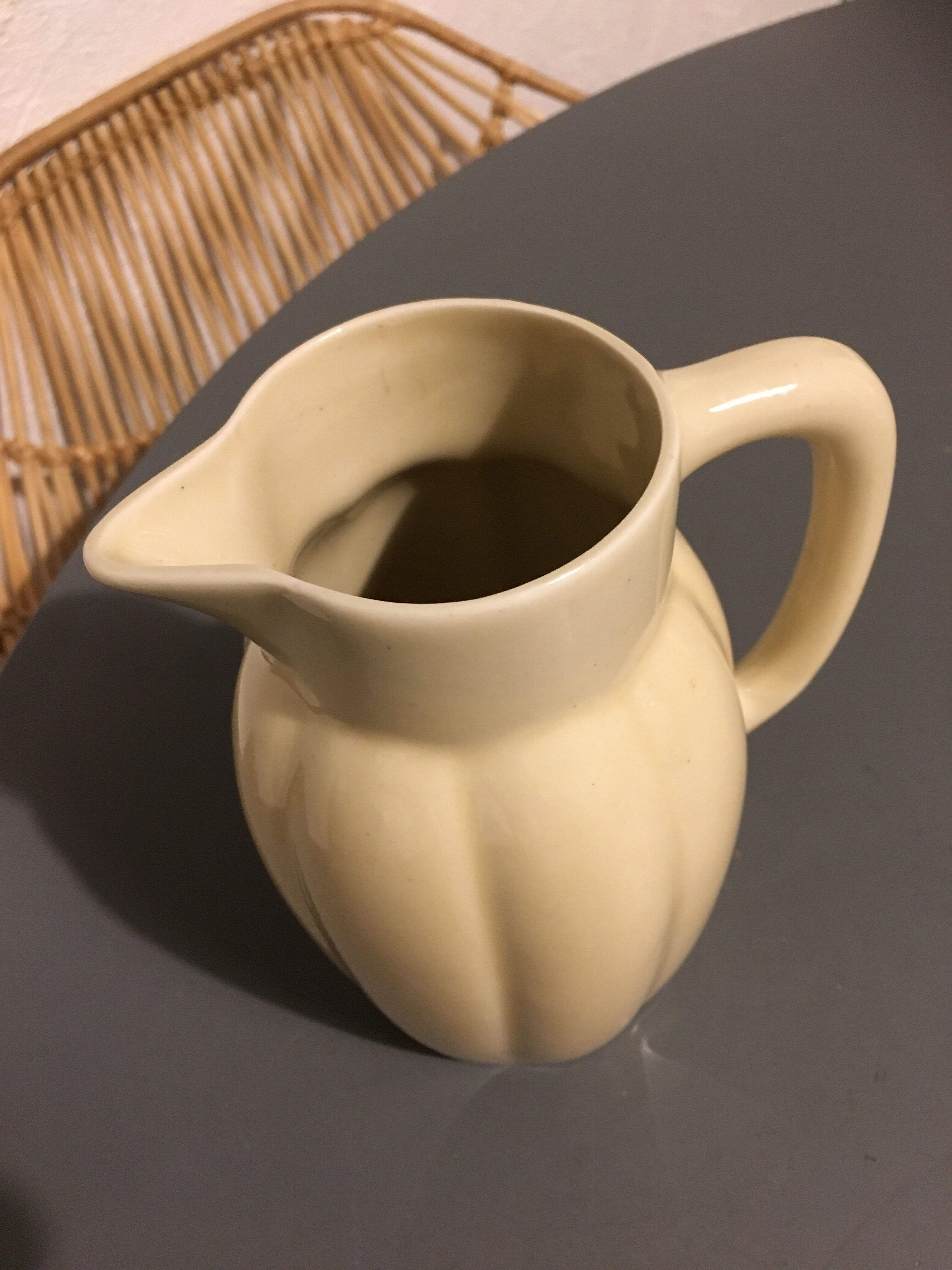 Cream color earthenware pitcher