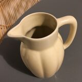 Cream color earthenware pitcher