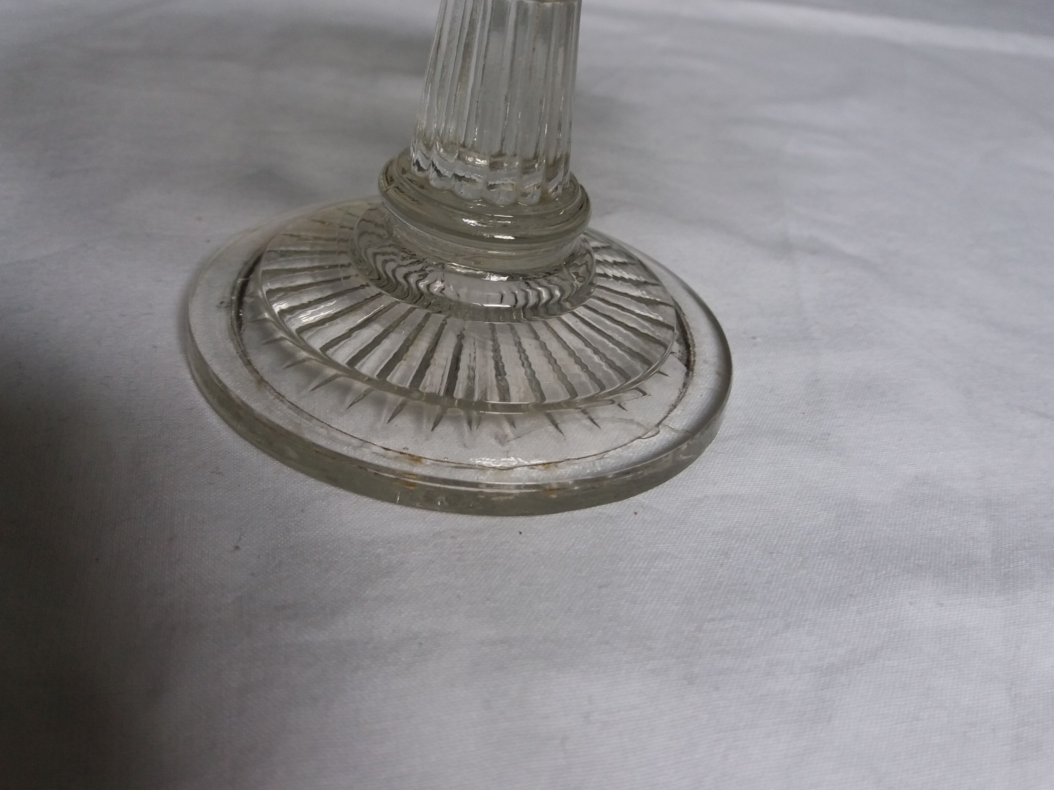 Cup on foot openwork chiseled glass
