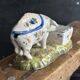 Antique earthenware pig box, salt cellar or mustard pot, floral decoration.