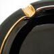 Black ceramic ashtray and vintage gold 50/60