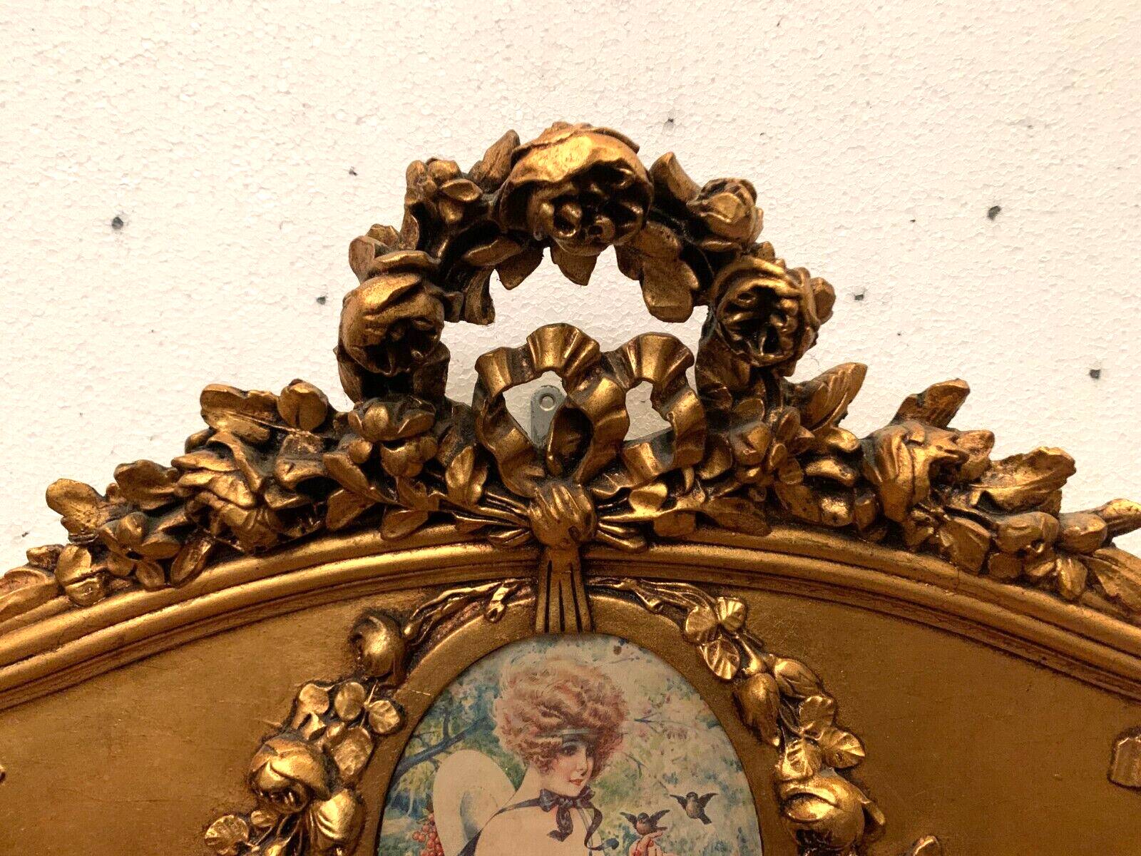 Louis XVI style mirror in wood and gilded stucco 20th century