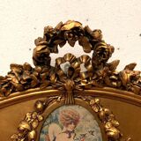 Miroir de style Louis XVI en bois et stuc doré XX siècle