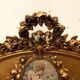 Louis XVI style mirror in wood and gilded stucco 20th century