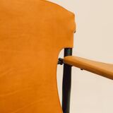 Maërl armchair, Galathée model, natural leather, solid wood armrests of your choice