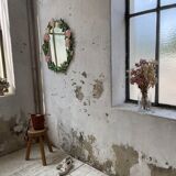 Oval ceramic mirror with flowers