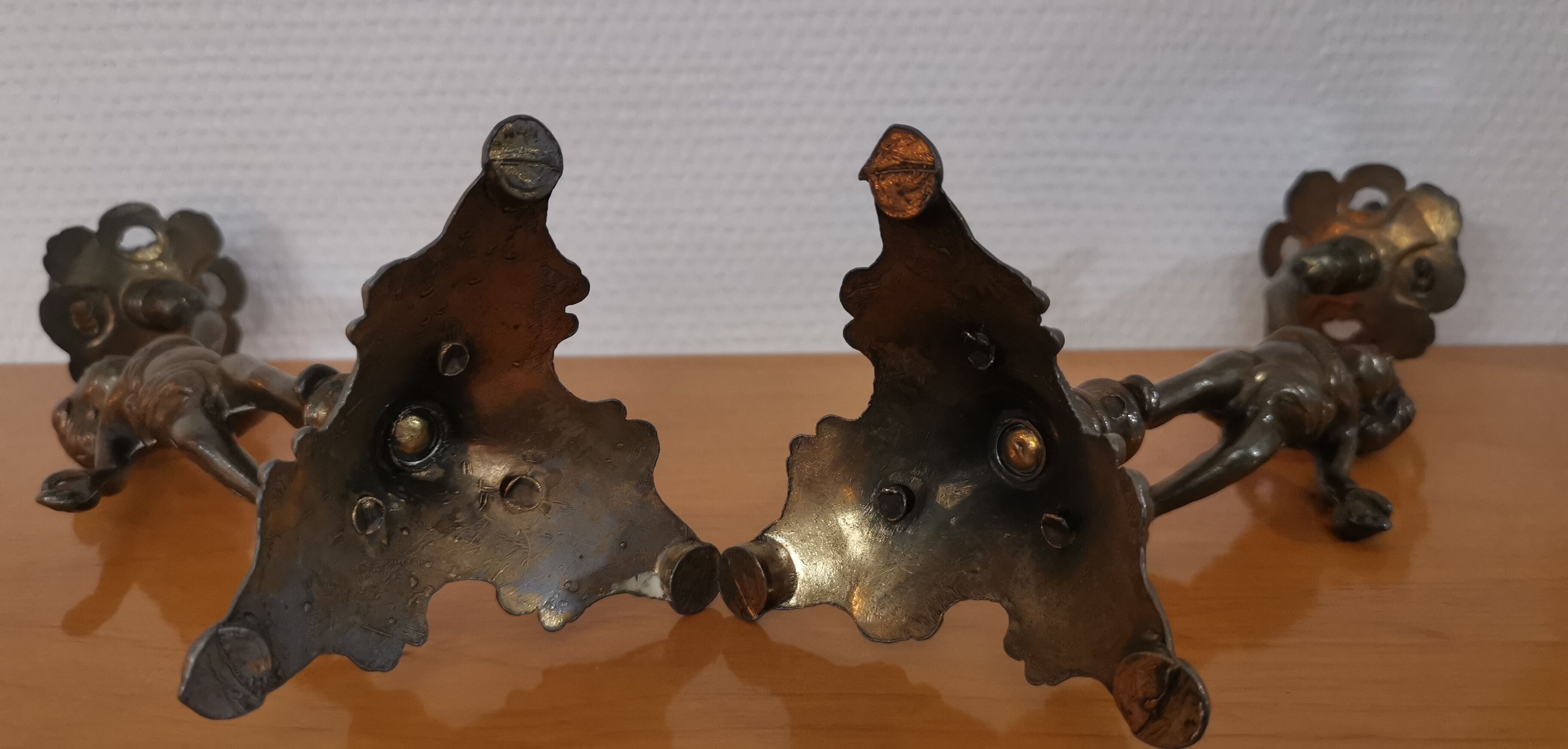 Pair of antique candlesticks in bronze and brass