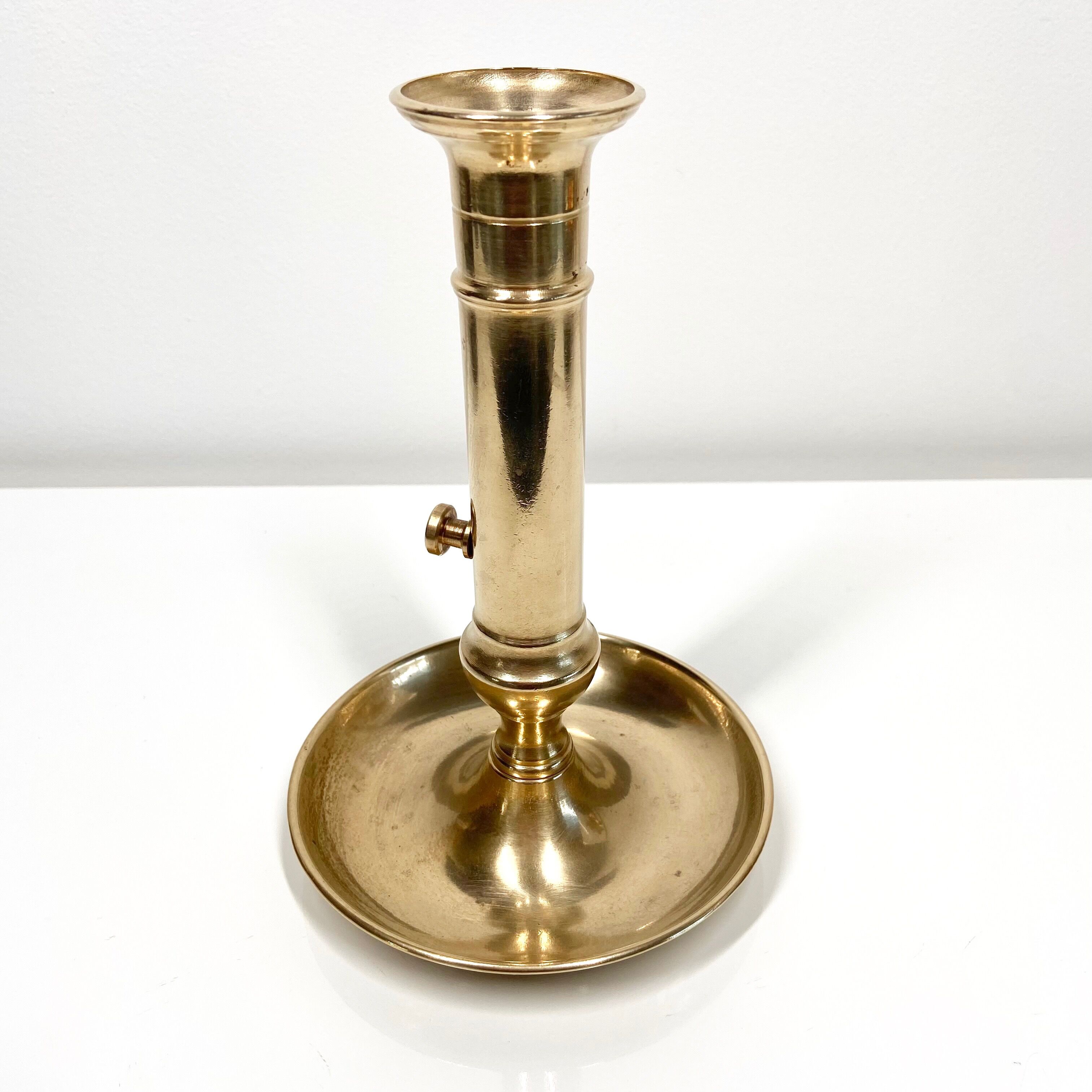 Pusher candle holder and solid brass