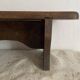 Old low stool made of solid wood