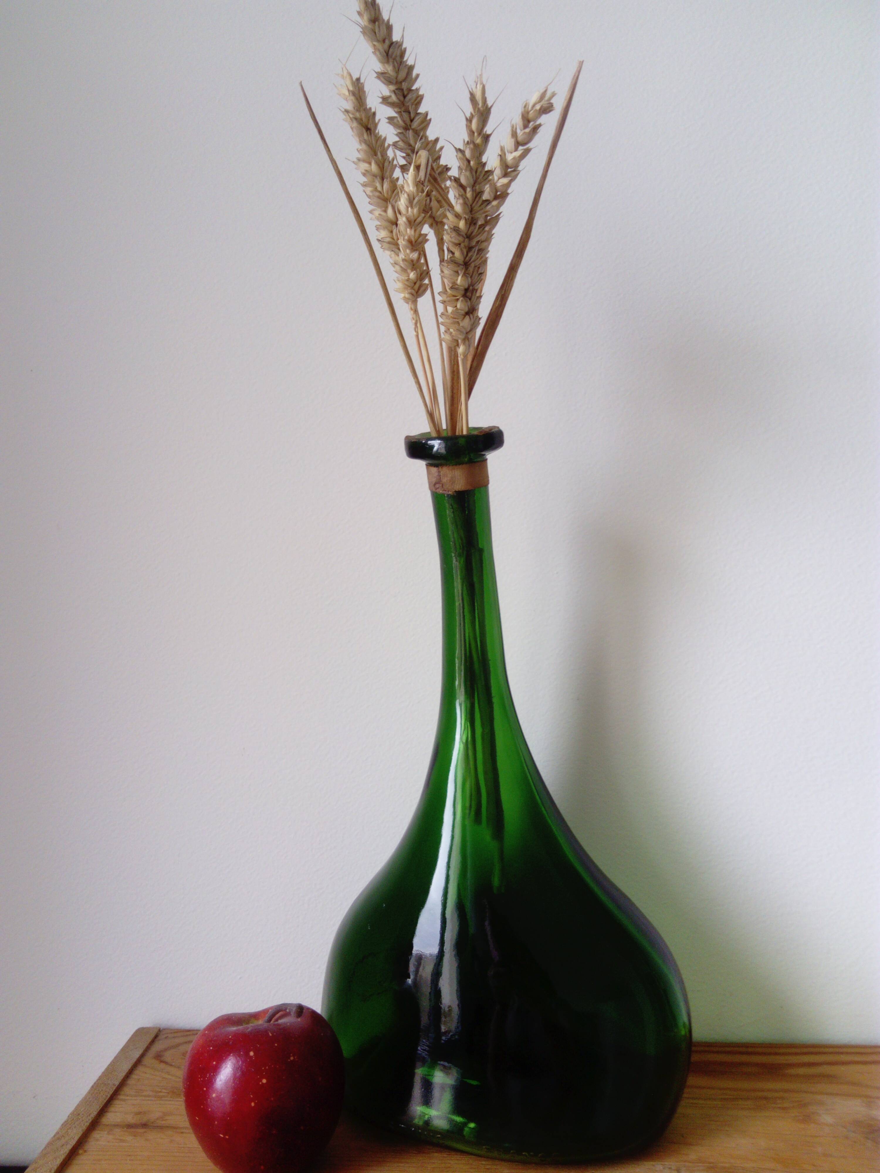 Old blown glass bottle, free form. Armagnac