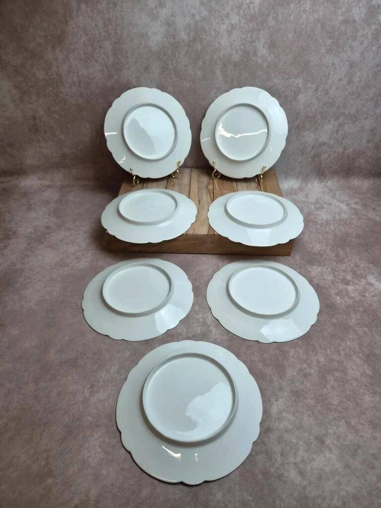 Set of 7 antique porcelain plates – Decorated with polychrome birds and flowers