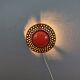 Wall light made from brown and red ceramic. Signed Norman Motala Sweden 1970s.