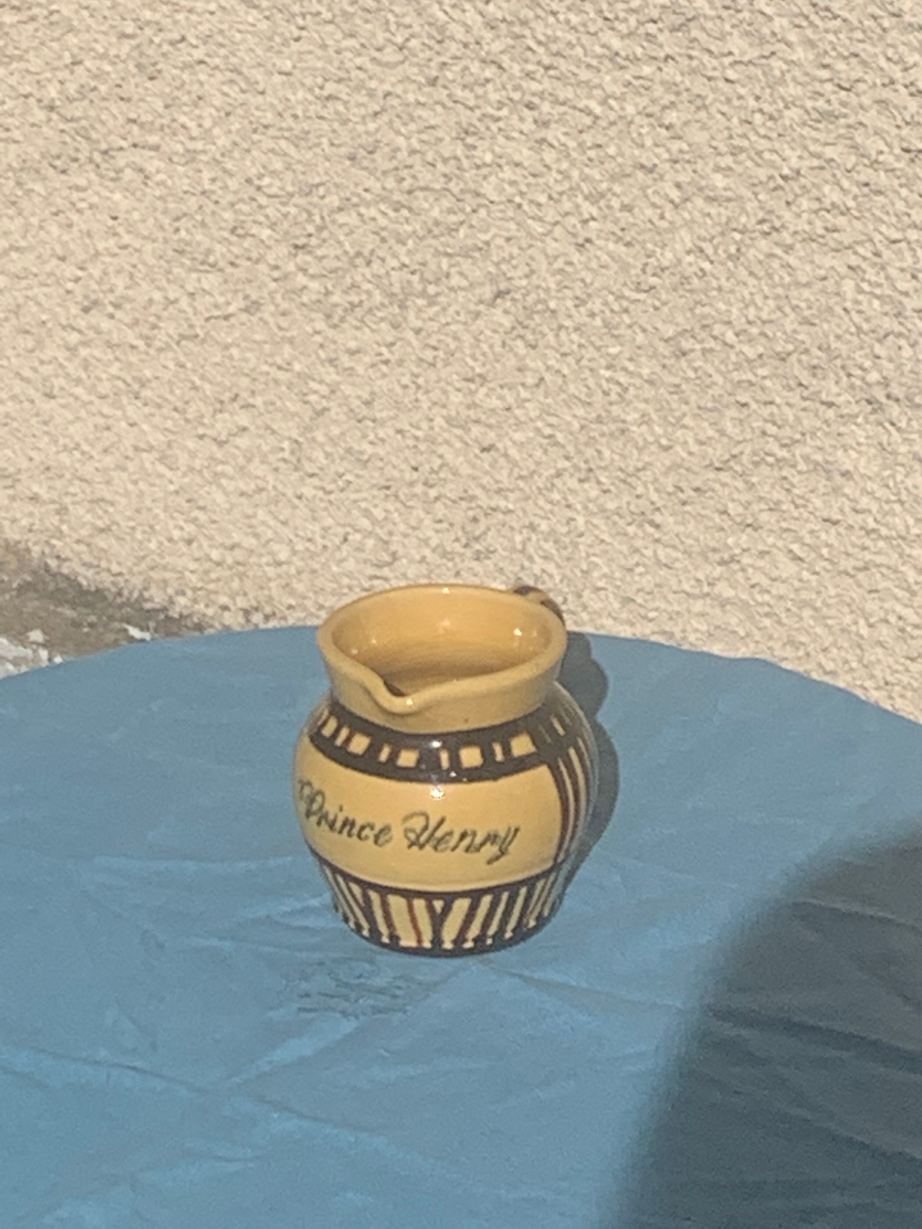 Vintage prince henry enamelled ceramic pitcher