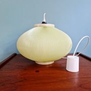 Vintage oval-shaped suspension in pleated celluloid, light green colour, 1960.