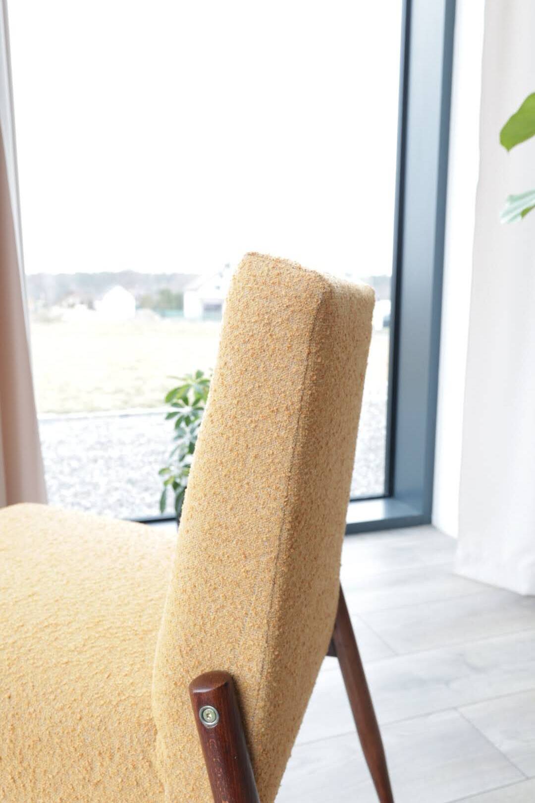 Yellow vintage lounge chair armrests boucle upholstery, walnut wood, Scandi