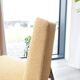Fauteuil lounge vintage jaune avec accoudoirs en tissu bouclé, bois de noyer, style scandinave