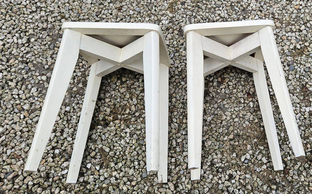 2 white painted wooden stools with compass legs