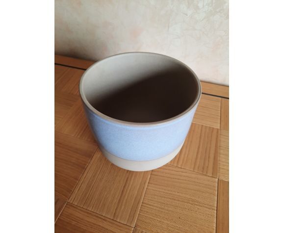 Ceramic pot cover.