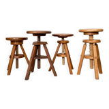 Set of 4 wooden screw stools.