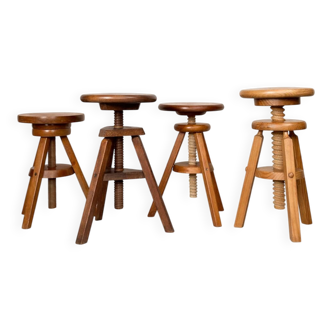 Set of 4 wooden screw stools.