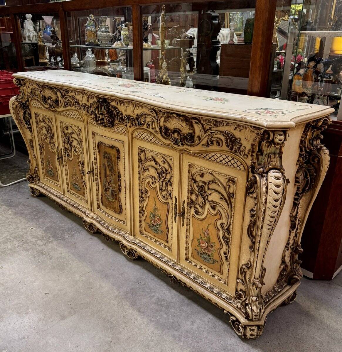 Curved Louis XV Venetian buffet in lacquered, painted, and gilded wood.