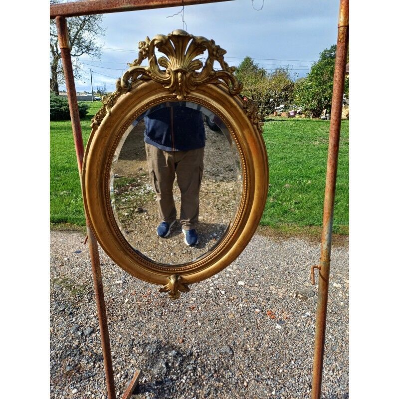 Miroir ovale en bois et stuc doré 19ème