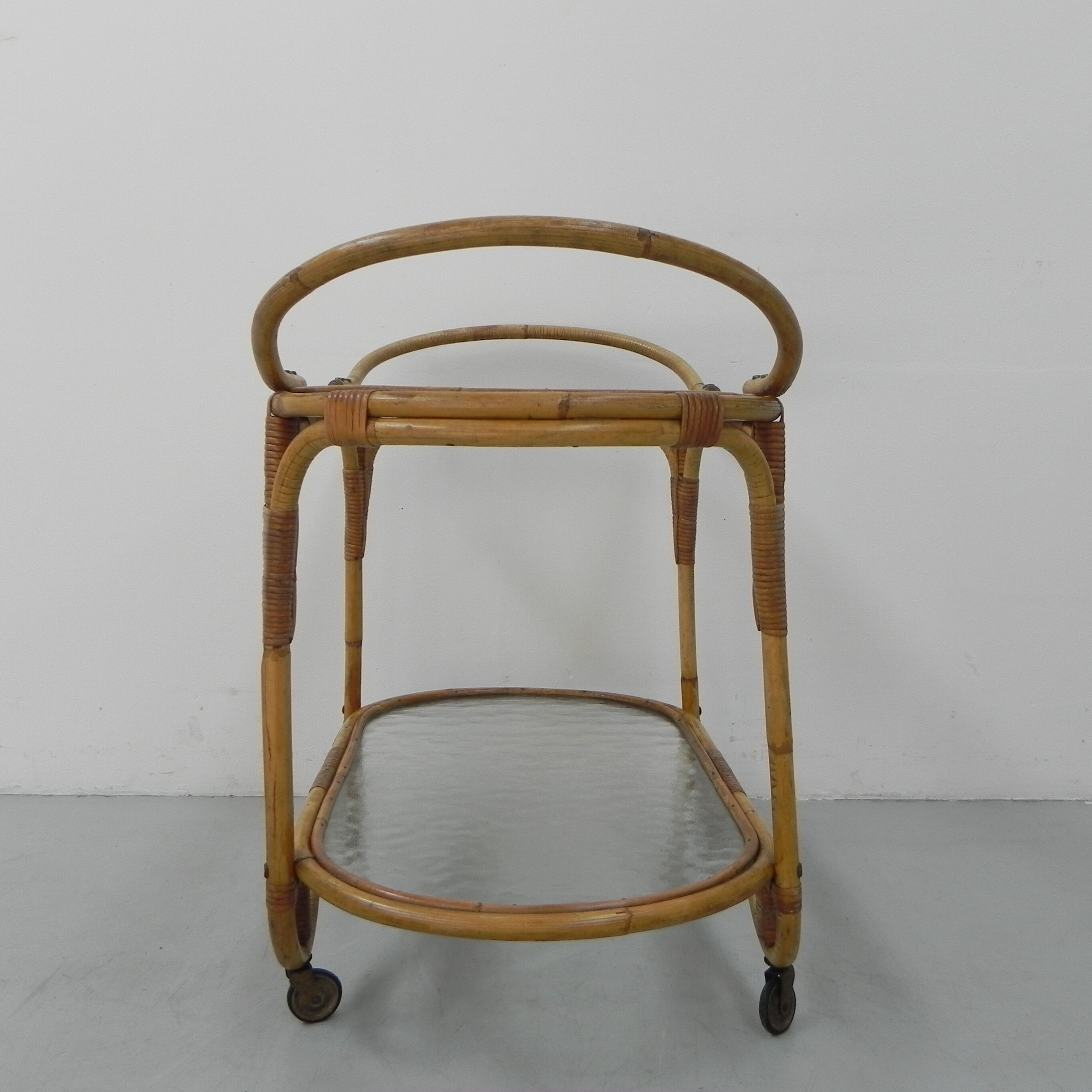 Bamboo, rattan serving trolley on castors