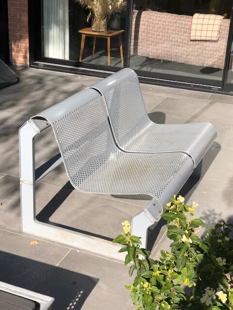 Perforated metal garden bench