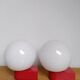 2 postmodern opaline and red metal wall lights, 1980