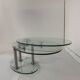 Oval designer coffee table in tempered glass