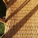 Wicker or rattan armchairs and bamboo