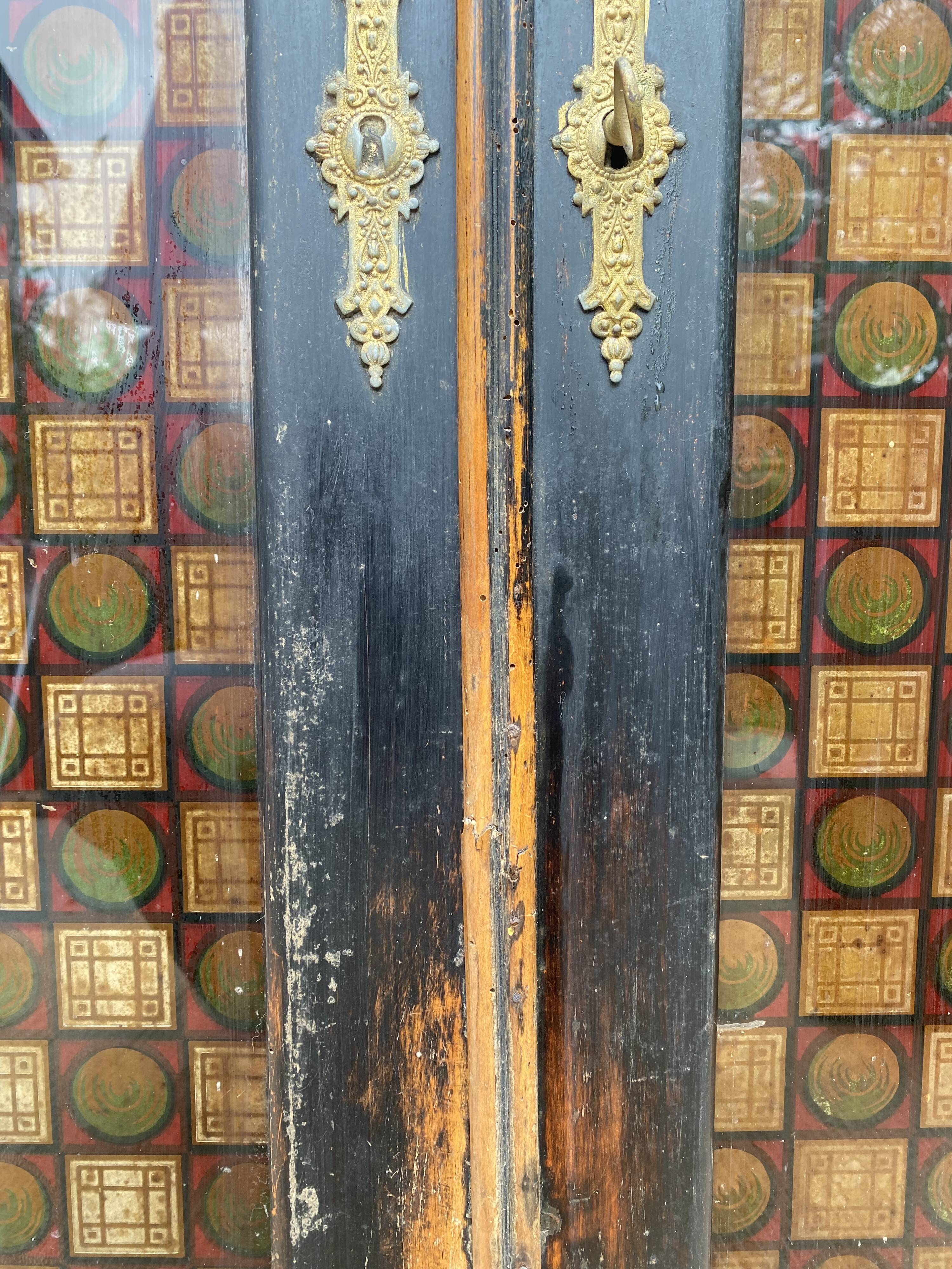 Double wood and glass closet doors