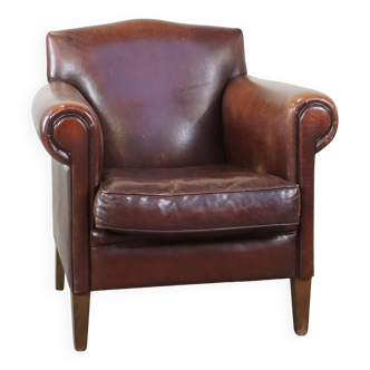 Design armchair made of sheep leather with a clean finish