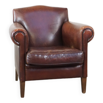 Design armchair made of sheep leather with a clean finish