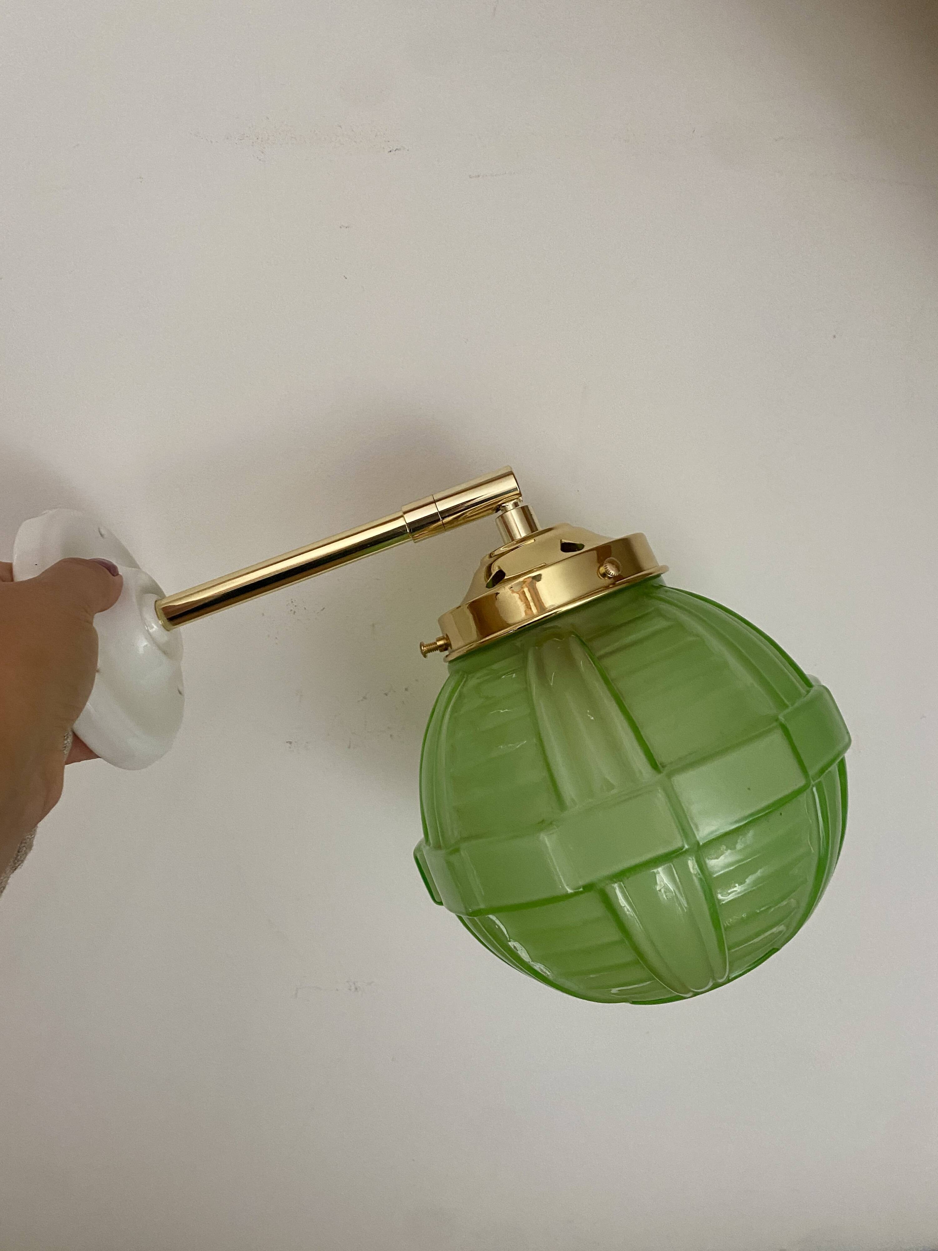 Vintage art deco globe wall light in green glass