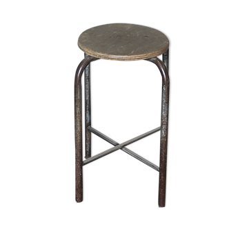 Old vintage metal and wood industrial workshop stool