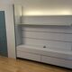 Low furniture, paneling and two-column Globo composition by Roche Bobois.