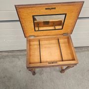 Antique dressing table with floral marquetry and integrated mirror.