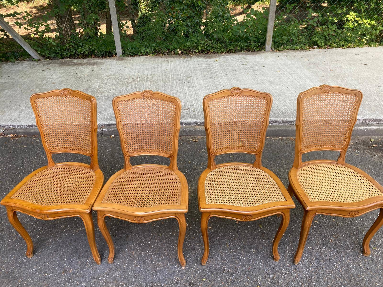 4 Louis XV dining chairs in light solid wood with caning.