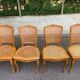 4 Louis XV dining chairs in light solid wood with caning.
