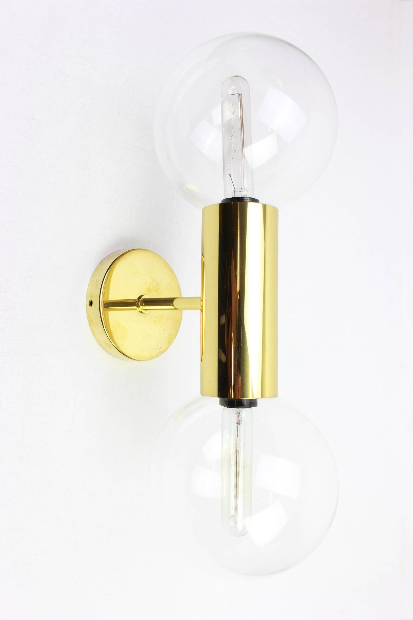 Pair of mid-century design wall lamps by Motoko Ishii for Staff, Germany, 1970s.