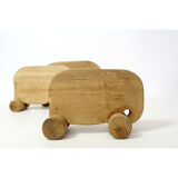Ensemble de trois éléphants en bois à roulette